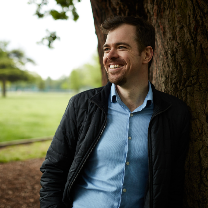 man standing near tree